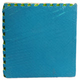 Orange EVA interlocking floor mat with colorful puzzle edges